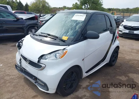 2014 Smart Fortwo Passion z USA, uszkodzony, nr VIN WMEEJ3BAXEK733454